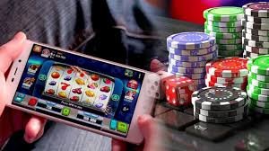 Filipino player browsing tropawin game lobby on a mobile phone